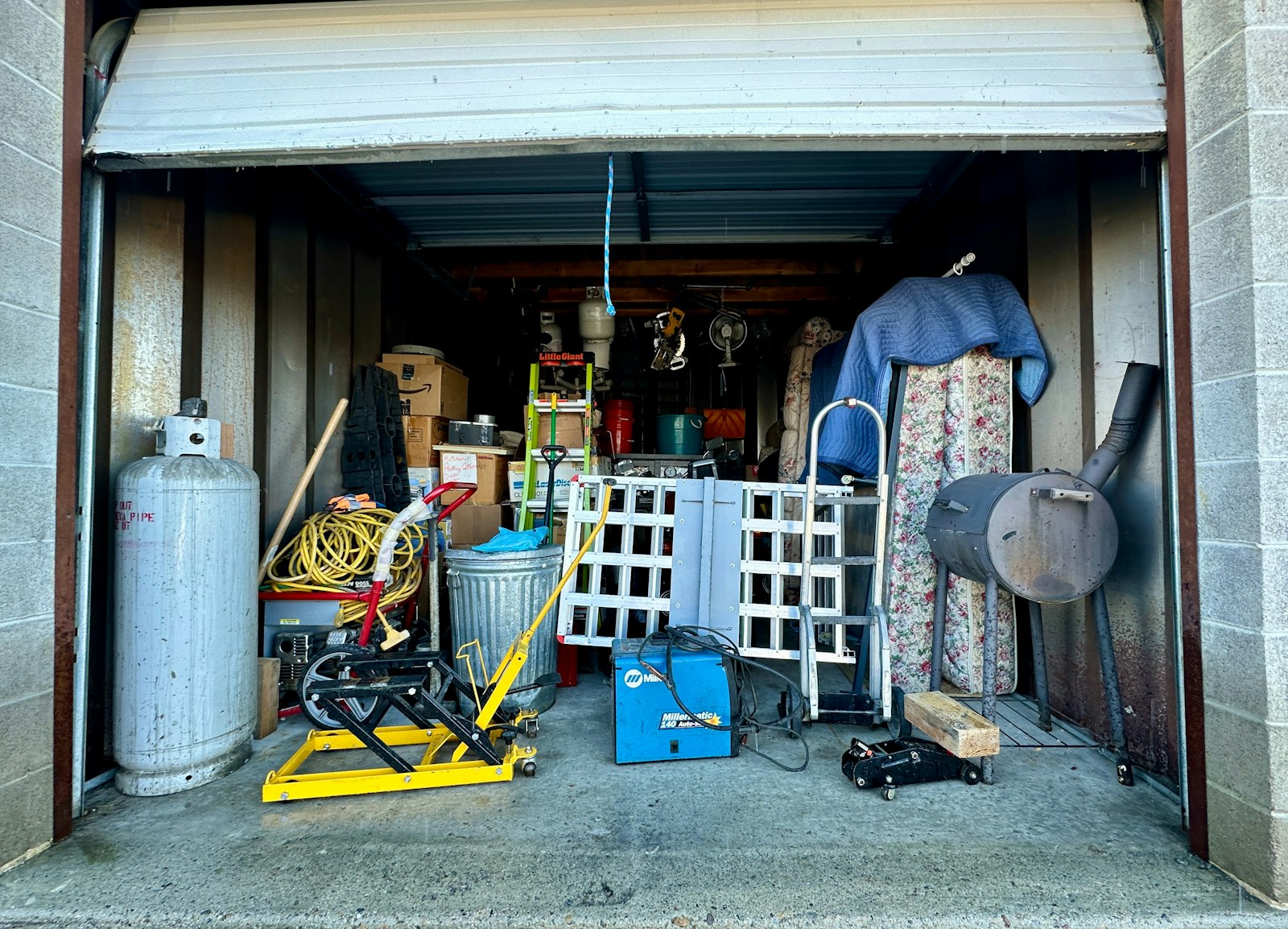 A packed garage full of stuff — the kind of cleanout Haul Delaware handles.
